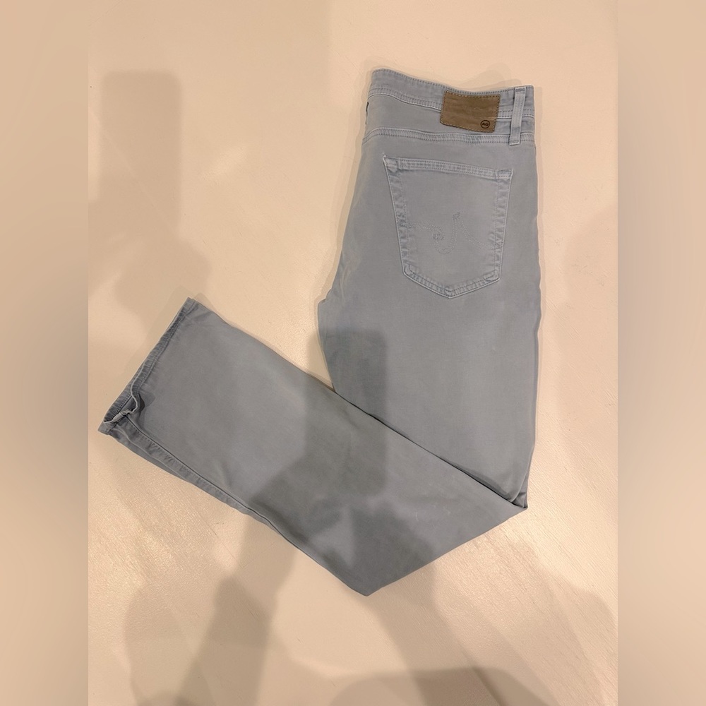 AG sueded blue Graduate men’s jean in 34. New condition.